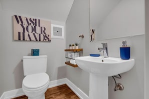 You feel a sense of calm as you enter the bathroom, where the thoughtful design and high-quality materials create a serene environment.