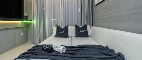 A well-designed studio apartment in Dubai with a modern and cozy feel.
