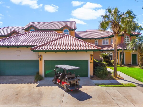 Front of Townhome & 6 Seat Golf Cart & Private Driveway