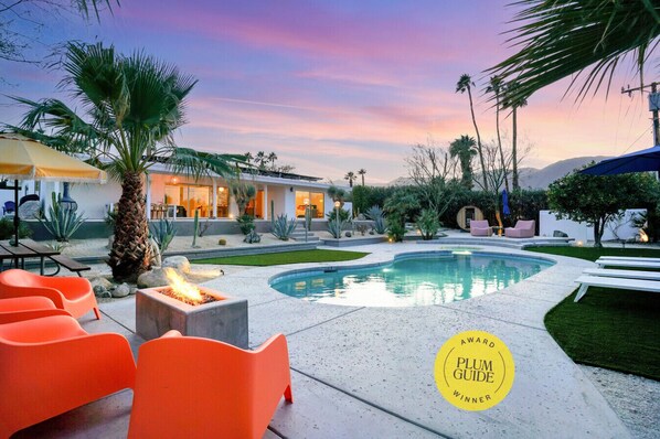Gorgeous sunset and mountain views for our multi-level backyard. Heated pool, fire pit, hot tub and more!