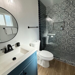 Newly renovated bath off primary bedroom, hotel-grade towels
