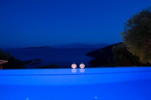 Pool with sea view in night (2)