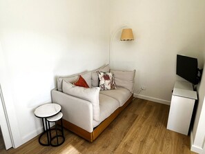 The comfortable lounge area is part of the open plan kitchen and dining space. 