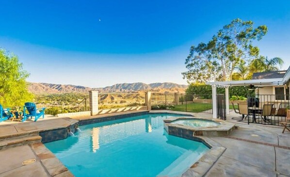 Private backyard pool and hot tub