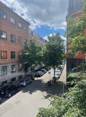 view of the square from the apartment through the french doors.