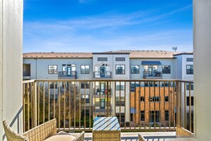 Balcony with courtyard views.