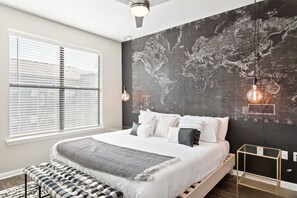 Stylish bedroom with accent wall.