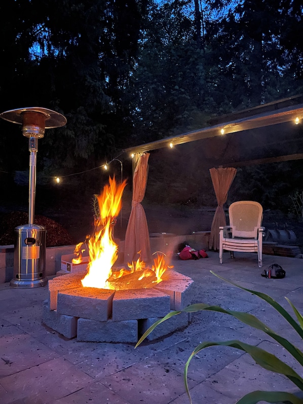 14x20 patio to enjoy quiet evening with a fire, grill and patio seating.