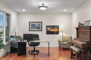 Office desk, chair, printer, piano