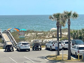Balcony view -17th Street walk-over to the crashing waves & toes in the sand
