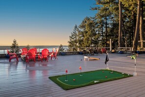 Swing, relax, and soak in the views—our patio’s putting green awaits!
