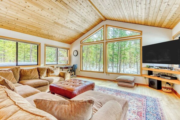 Large great room with a comfy couch to watch TV