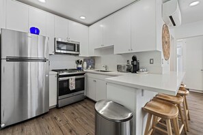 Kitchen is located right as you enter the home.  It has all kitchen essentials needed for a comfortable stay. 