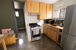 The kitchen is stocked for easy meal prep.