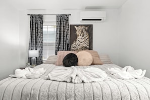 Bedroom: Drift into a peaceful sleep in this plush and inviting bedroom.
