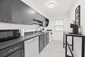 Kitchen: Bright and functional, this kitchen makes cooking a breeze during your stay