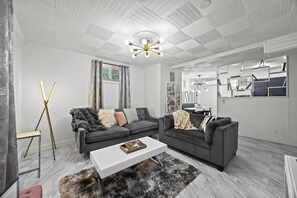Living Room: Sink into comfort and style in this chic and inviting living space.