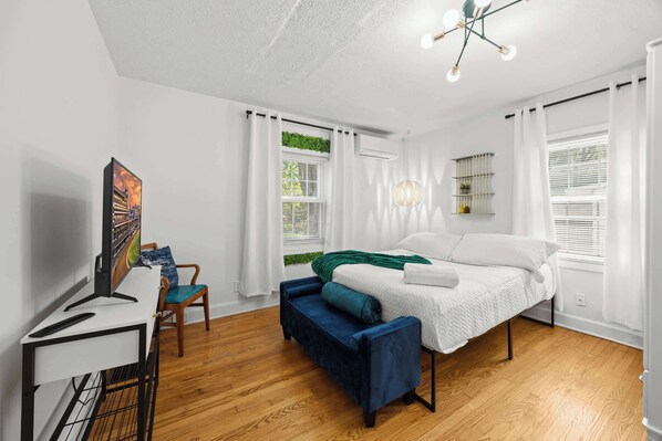 Bedroom 2: Drift off to dreamland in this stylish and serene bedroom.