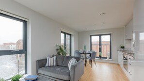 The large windows mean the apartment is bright and airy
