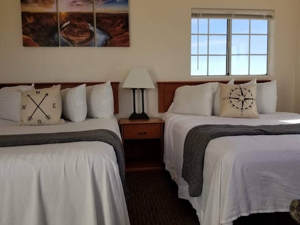 Bedroom 1 with 2 Queen Sized Beds