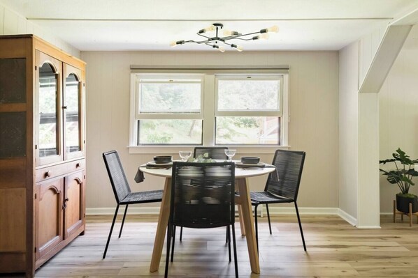 Our circular kitchen table seats four, and we have additional chairs to seat up to six people.