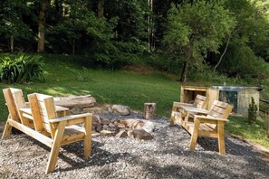 Build a fire in the stone fire pit, gaze up at the stars, and relax. 