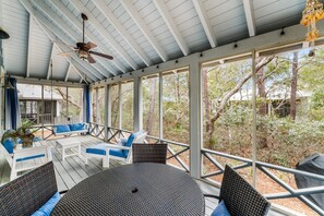 Wonderful screened porch with swing.