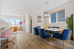 Experience A Touch Of Luxury In Our Vibrant Royal Blue Dining Area Designed For Style