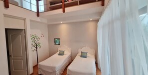 Bedroom 3 with two twin beds with balcony