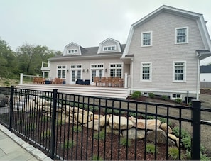 Backside of the house from the pool and patio.