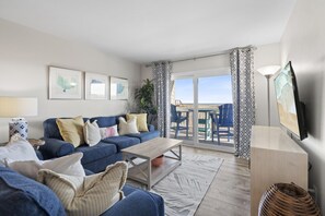 Living room with comfortable couches and smart TV