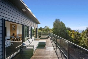 Balcony off the living area, with plenty of outside seating