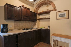 Countertop, Kitchen, Kitchen Appliance, Cabinetry, Wood, Interior Design, Flooring, Furniture, Major Appliance, Floor