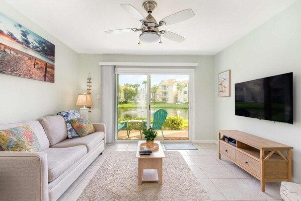 Spacious living room with pond view