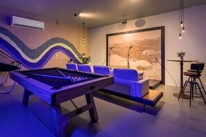 Sing your heart out in the Karaoke room, complete with stage and microphones, and games including billiards and arcade basketball.