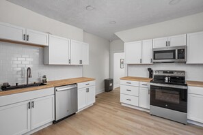 Kitchen: Modern style meets culinary creativity with sleek finishes and brand-new appliances!