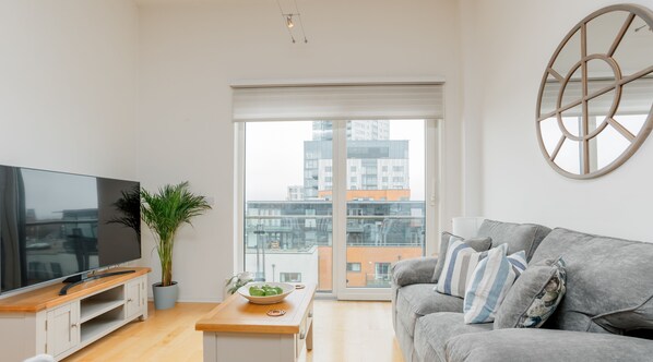 The lounge area provides access to the balcony and benefits from a Smart TV