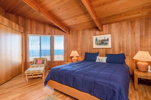The primary king suite boasts water views & an ensuite bath