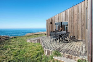 Lounge the day away or dine alfresco with stunning views on the deck