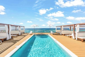 The Sands is Grand Cayman's first residential tower with a rooftop pool deck. 