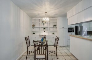 Conveniently located just steps from the kitchen, this dining area is great for grabbing a quick bite to eat and settling in for a nice sit-down meal!