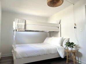 Twin over queen bunk bed. Memory foam mattresses, blackout shades, Roku TV.