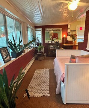 Escape to the Sunroom for peaceful reading and a dedicated workspace