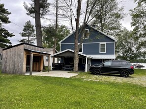 Plenty of parking and covered patio with picnic table, gas grill, Blackstone 
