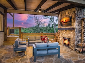 Lounging by the outdoor fireplace with mountain view, your perfect escape is here!