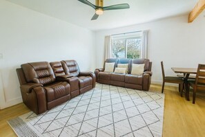 Leather Recliners and sliding glass doors to front yard