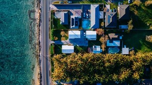 Our drone shot offers a bird's eye view of the gorgeous beach area, highlighting the natural beauty and serenity of the location.