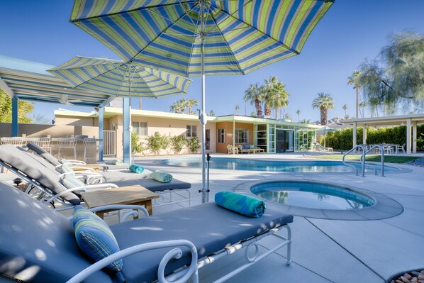 Spacious backyard with renovated pool and new spa in an historic home. 