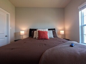 Queen bed with purple mattress