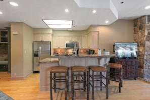 Indoors, Floor, Flooring, Kitchen, Refrigerator
